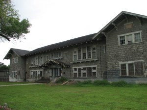 The front view of Lakeview School from Milne Boulevard. It was built in 1913 and then rebuilt in 1915 after a fire. It has been sitting idle since being damaged in the floods caused by Hurricane Katrina.